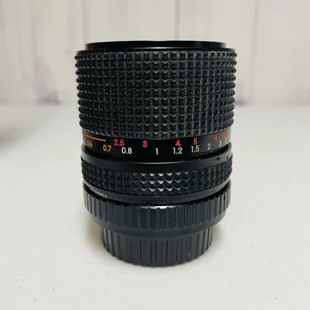 RKN MC AUTO ZOOM 1:3.5-4.5 f=35-70MM CAMERA LENS